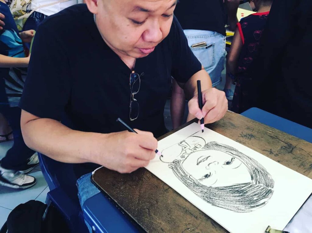 2 hands caricature artist