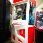 Branding-on-arcade-claw-machine