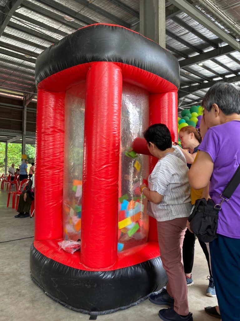 Inflatable Cash Box Rental for Elderly Event